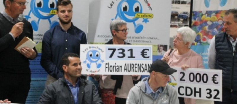 Remise des chèques Bouchons d'Amour au Grand Garage Auscitain 