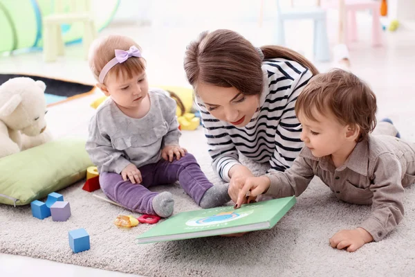 depositphotos_212009696-stock-photo-cute-little-girl-young-nanny.jpg